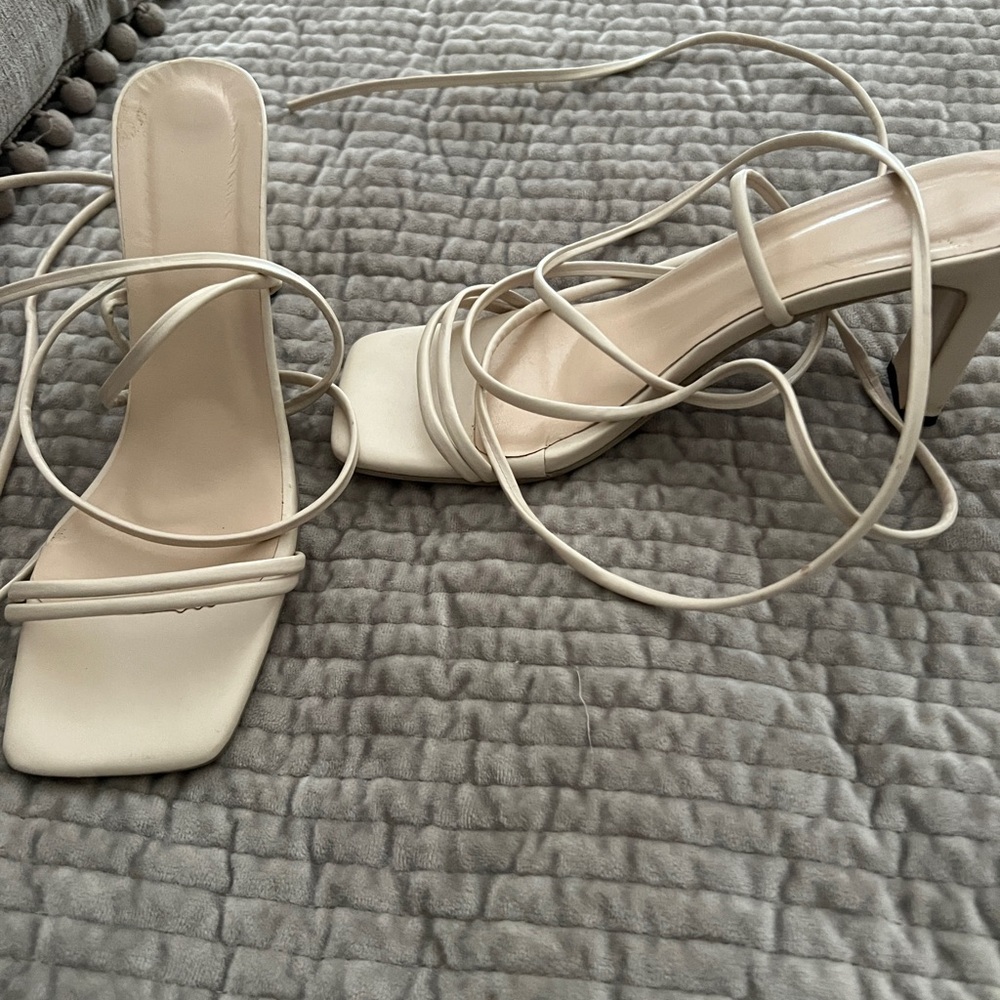Sandals with heels and wrap around straps